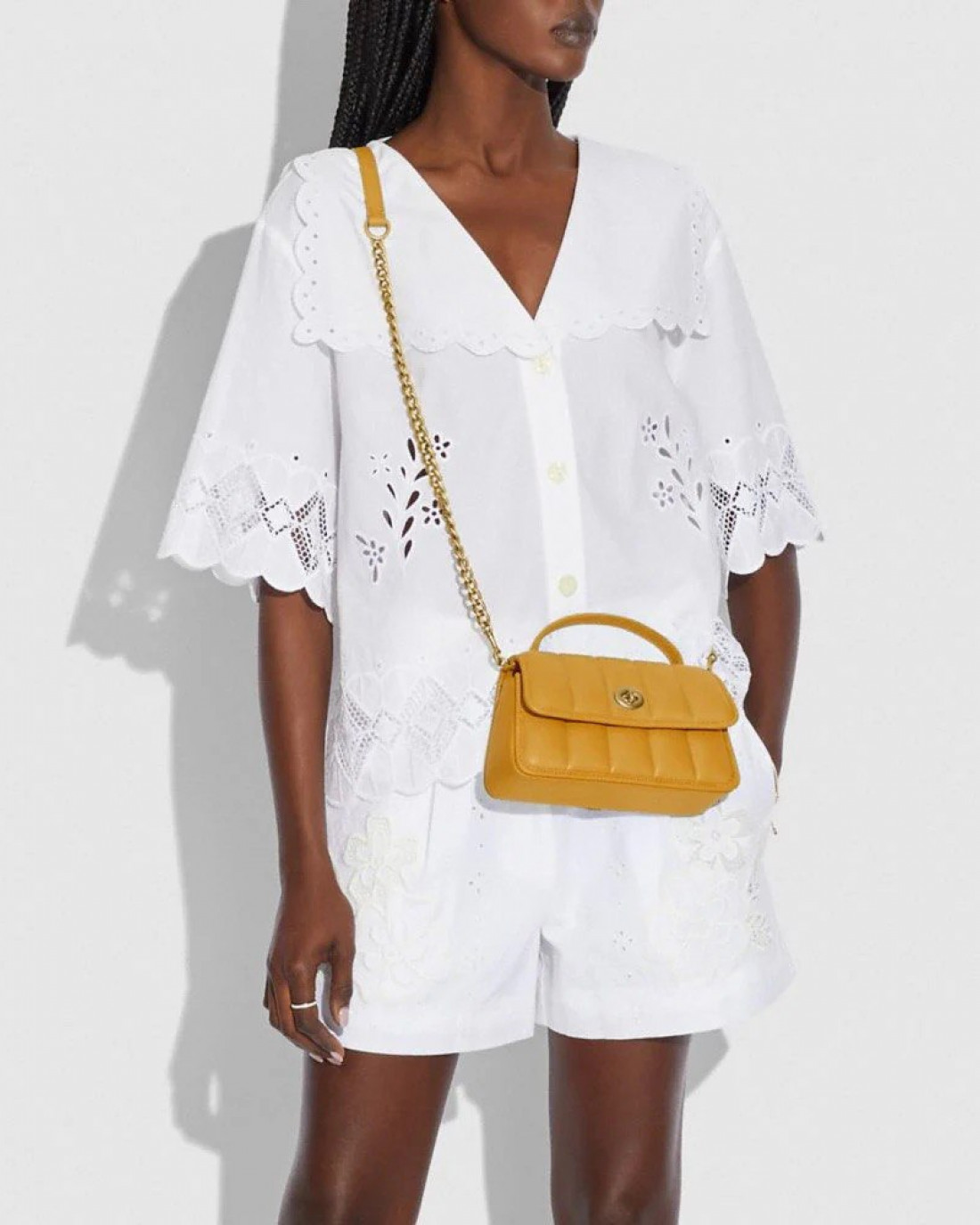 Coach turnlock clutch white best sale