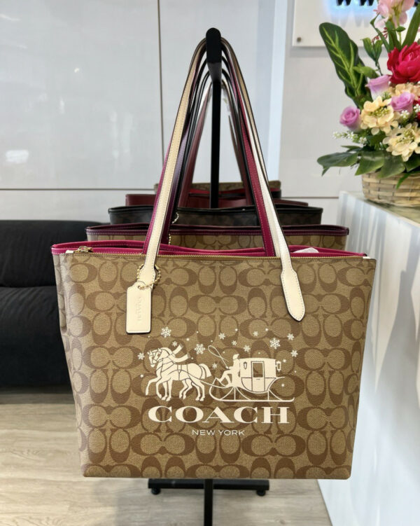 Coach Zip Top Tote In Signature Canvas With Horse And Sleigh (gold/khaki/chalk)