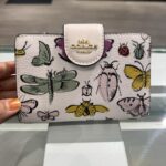 Coach Medium Corner Zip Wallet In Signature Canvas With Creature Print (Chalk Multi)