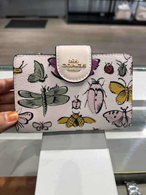 Coach Medium Corner Zip Wallet In Signature Canvas With Creature Print (Chalk Multi)