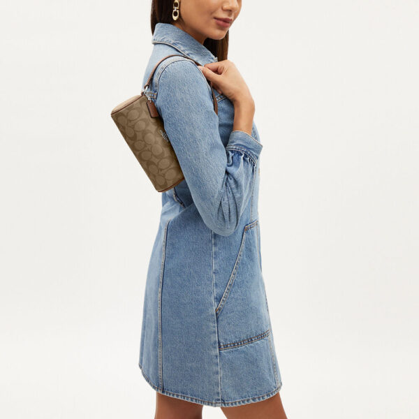 Coach Nolita Barrel Bag In Signature Canvas (Saddle) - Image 2
