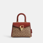 Coach Sammy Top Handle 21 In Signature Canvas (Tan) - Boutique Collection