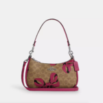 Coach Teri Shoulder Bag In Signature Canvas With Bow Print (Tan Pink Multi)